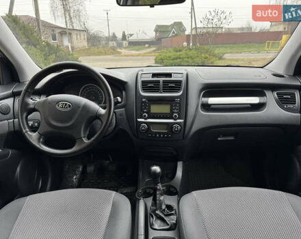 Серый Киа Sportage, объемом двигателя 2 л и пробегом 86 тыс. км за 10200 $, фото 23 на Automoto.ua