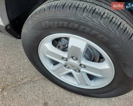Серый Киа Sportage, объемом двигателя 2 л и пробегом 186 тыс. км за 9100 $, фото 86 на Automoto.ua