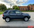 Серый Киа Sportage, объемом двигателя 2 л и пробегом 270 тыс. км за 9000 $, фото 3 на Automoto.ua