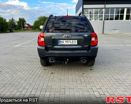 Серый Киа Sportage, объемом двигателя 2 л и пробегом 270 тыс. км за 9000 $, фото 2 на Automoto.ua