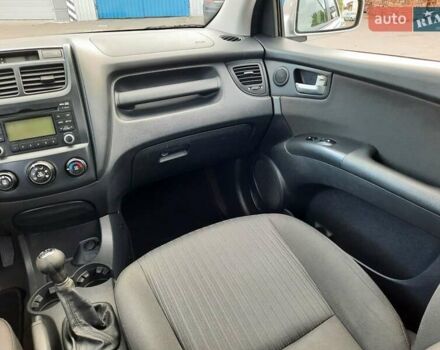 Серый Киа Sportage, объемом двигателя 2 л и пробегом 186 тыс. км за 9100 $, фото 67 на Automoto.ua