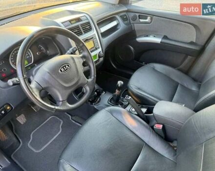 Серый Киа Sportage, объемом двигателя 1.98 л и пробегом 219 тыс. км за 9200 $, фото 5 на Automoto.ua