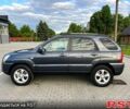 Серый Киа Sportage, объемом двигателя 2 л и пробегом 270 тыс. км за 9000 $, фото 1 на Automoto.ua