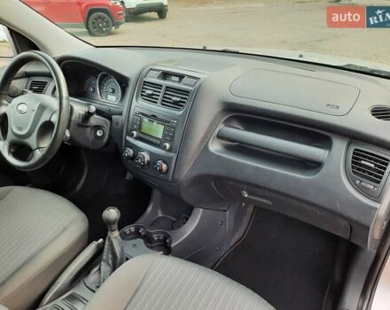 Серый Киа Sportage, объемом двигателя 2 л и пробегом 186 тыс. км за 9100 $, фото 131 на Automoto.ua