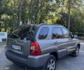 Серый Киа Sportage, объемом двигателя 2 л и пробегом 206 тыс. км за 8900 $, фото 2 на Automoto.ua