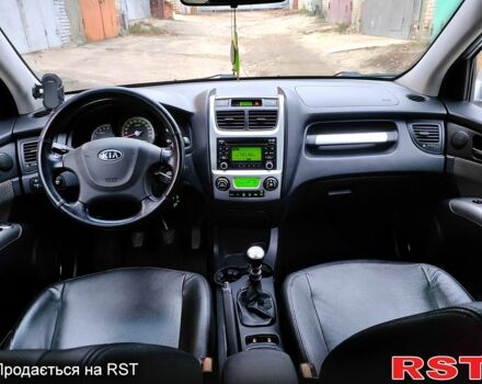 Серый Киа Sportage, объемом двигателя 2 л и пробегом 250 тыс. км за 8250 $, фото 5 на Automoto.ua