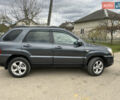 Серый Киа Sportage, объемом двигателя 1.99 л и пробегом 241 тыс. км за 8650 $, фото 4 на Automoto.ua