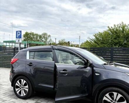 Серый Киа Sportage, объемом двигателя 2 л и пробегом 153 тыс. км за 12000 $, фото 4 на Automoto.ua