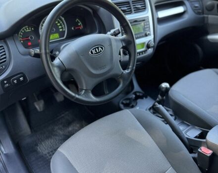 Серый Киа Sportage, объемом двигателя 2 л и пробегом 206 тыс. км за 8900 $, фото 6 на Automoto.ua