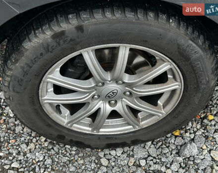 Серый Киа Sportage, объемом двигателя 2 л и пробегом 208 тыс. км за 12400 $, фото 9 на Automoto.ua
