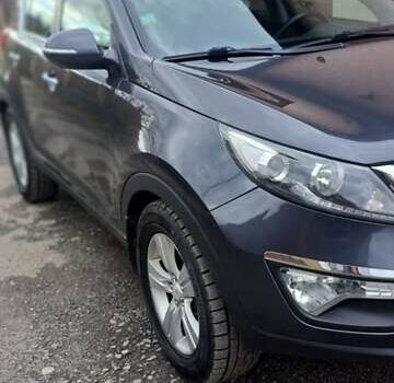 Серый Киа Sportage, объемом двигателя 2 л и пробегом 214 тыс. км за 12000 $, фото 5 на Automoto.ua