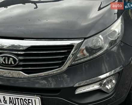 Серый Киа Sportage, объемом двигателя 2 л и пробегом 208 тыс. км за 12400 $, фото 8 на Automoto.ua