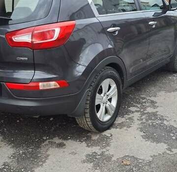 Серый Киа Sportage, объемом двигателя 2 л и пробегом 214 тыс. км за 12000 $, фото 7 на Automoto.ua