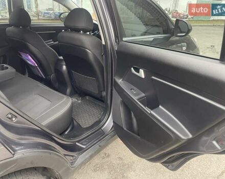 Серый Киа Sportage, объемом двигателя 2 л и пробегом 77 тыс. км за 12500 $, фото 17 на Automoto.ua