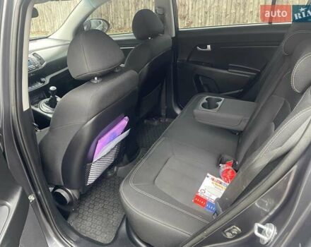 Серый Киа Sportage, объемом двигателя 2 л и пробегом 77 тыс. км за 12500 $, фото 10 на Automoto.ua