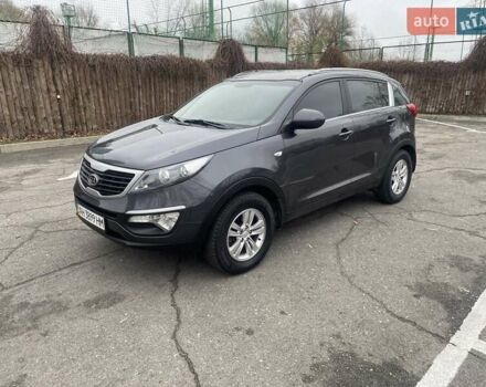 Серый Киа Sportage, объемом двигателя 2 л и пробегом 77 тыс. км за 12500 $, фото 1 на Automoto.ua