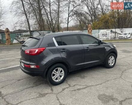 Серый Киа Sportage, объемом двигателя 2 л и пробегом 77 тыс. км за 12500 $, фото 4 на Automoto.ua