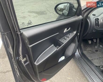 Серый Киа Sportage, объемом двигателя 2 л и пробегом 77 тыс. км за 12500 $, фото 11 на Automoto.ua