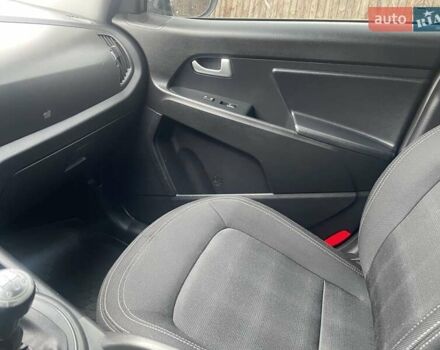 Серый Киа Sportage, объемом двигателя 2 л и пробегом 77 тыс. км за 12500 $, фото 35 на Automoto.ua