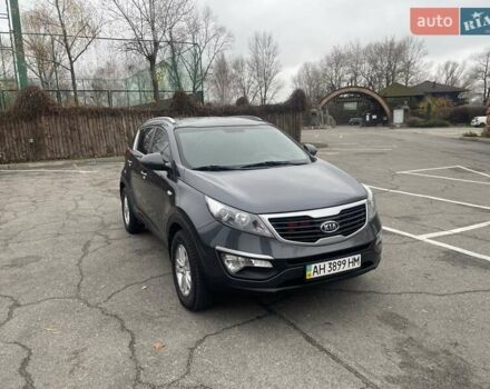 Серый Киа Sportage, объемом двигателя 2 л и пробегом 77 тыс. км за 12500 $, фото 2 на Automoto.ua
