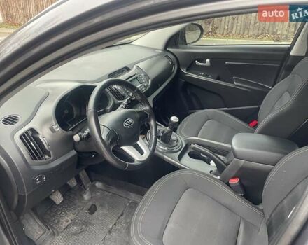 Серый Киа Sportage, объемом двигателя 2 л и пробегом 77 тыс. км за 12500 $, фото 7 на Automoto.ua