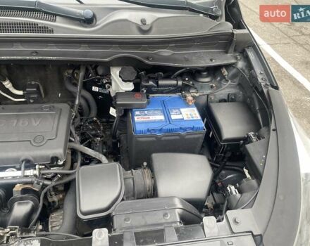 Серый Киа Sportage, объемом двигателя 2 л и пробегом 77 тыс. км за 12500 $, фото 27 на Automoto.ua