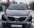 Серый Киа Sportage, объемом двигателя 2 л и пробегом 198 тыс. км за 13950 $, фото 1 на Automoto.ua