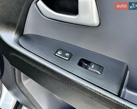 Серый Киа Sportage, объемом двигателя 2 л и пробегом 246 тыс. км за 12999 $, фото 62 на Automoto.ua