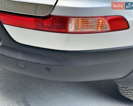 Серый Киа Sportage, объемом двигателя 2 л и пробегом 246 тыс. км за 12999 $, фото 42 на Automoto.ua