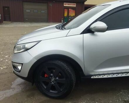 Серый Киа Sportage, объемом двигателя 2 л и пробегом 200 тыс. км за 13000 $, фото 4 на Automoto.ua
