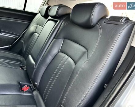 Серый Киа Sportage, объемом двигателя 2 л и пробегом 246 тыс. км за 12999 $, фото 85 на Automoto.ua