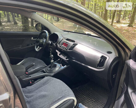 Серый Киа Sportage, объемом двигателя 1.7 л и пробегом 243 тыс. км за 12400 $, фото 10 на Automoto.ua
