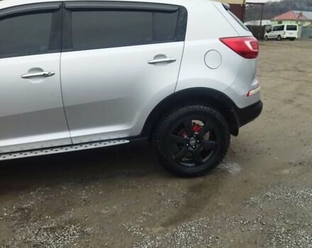 Серый Киа Sportage, объемом двигателя 2 л и пробегом 200 тыс. км за 13000 $, фото 3 на Automoto.ua