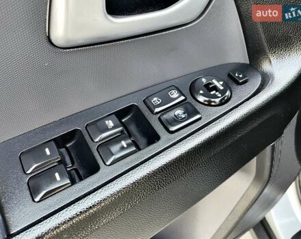 Серый Киа Sportage, объемом двигателя 2 л и пробегом 246 тыс. км за 12999 $, фото 49 на Automoto.ua