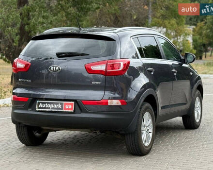 Серый Киа Sportage, объемом двигателя 1.7 л и пробегом 244 тыс. км за 11490 $, фото 4 на Automoto.ua