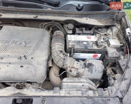 Серый Киа Sportage, объемом двигателя 2 л и пробегом 225 тыс. км за 13000 $, фото 19 на Automoto.ua