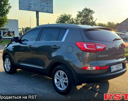Серый Киа Sportage, объемом двигателя 2 л и пробегом 141 тыс. км за 12850 $, фото 4 на Automoto.ua