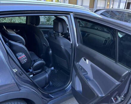 Серый Киа Sportage, объемом двигателя 2 л и пробегом 190 тыс. км за 15500 $, фото 7 на Automoto.ua