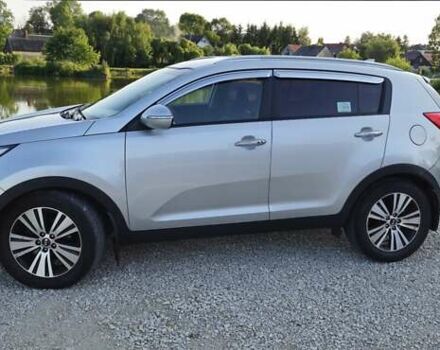 Сірий Кіа Sportage, об'ємом двигуна 2 л та пробігом 208 тис. км за 14800 $, фото 13 на Automoto.ua
