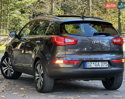 Серый Киа Sportage, объемом двигателя 2 л и пробегом 197 тыс. км за 14599 $, фото 78 на Automoto.ua