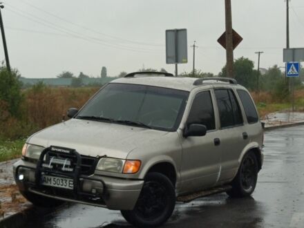 Серый Киа Sportage, объемом двигателя 2 л и пробегом 300 тыс. км за 2300 $, фото 1 на Automoto.ua