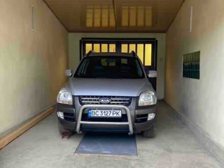 Серый Киа Sportage, объемом двигателя 2 л и пробегом 249 тыс. км за 6500 $, фото 1 на Automoto.ua