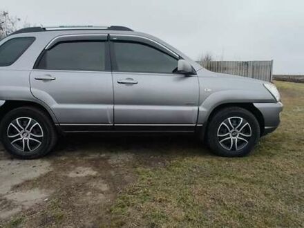 Серый Киа Sportage, объемом двигателя 2 л и пробегом 390 тыс. км за 5000 $, фото 1 на Automoto.ua