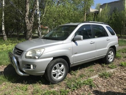 Серый Киа Sportage, объемом двигателя 2 л и пробегом 240 тыс. км за 6700 $, фото 1 на Automoto.ua