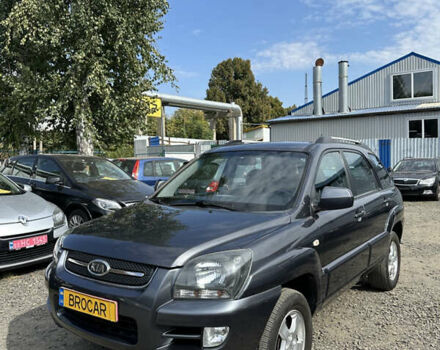Серый Киа Sportage, объемом двигателя 2 л и пробегом 302 тыс. км за 7400 $, фото 1 на Automoto.ua