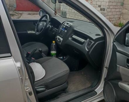 Серый Киа Sportage, объемом двигателя 2 л и пробегом 235 тыс. км за 7800 $, фото 1 на Automoto.ua