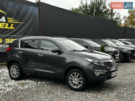 Серый Киа Sportage, объемом двигателя 2 л и пробегом 208 тыс. км за 12400 $, фото 1 на Automoto.ua