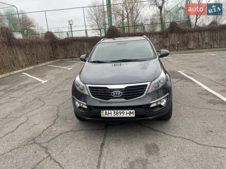 Серый Киа Sportage, объемом двигателя 2 л и пробегом 77 тыс. км за 12500 $, фото 1 на Automoto.ua