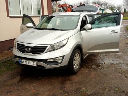 Серый Киа Sportage, объемом двигателя 2 л и пробегом 247 тыс. км за 11950 $, фото 1 на Automoto.ua