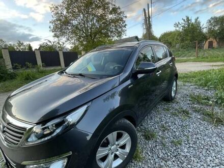 Серый Киа Sportage, объемом двигателя 2 л и пробегом 167 тыс. км за 14000 $, фото 1 на Automoto.ua